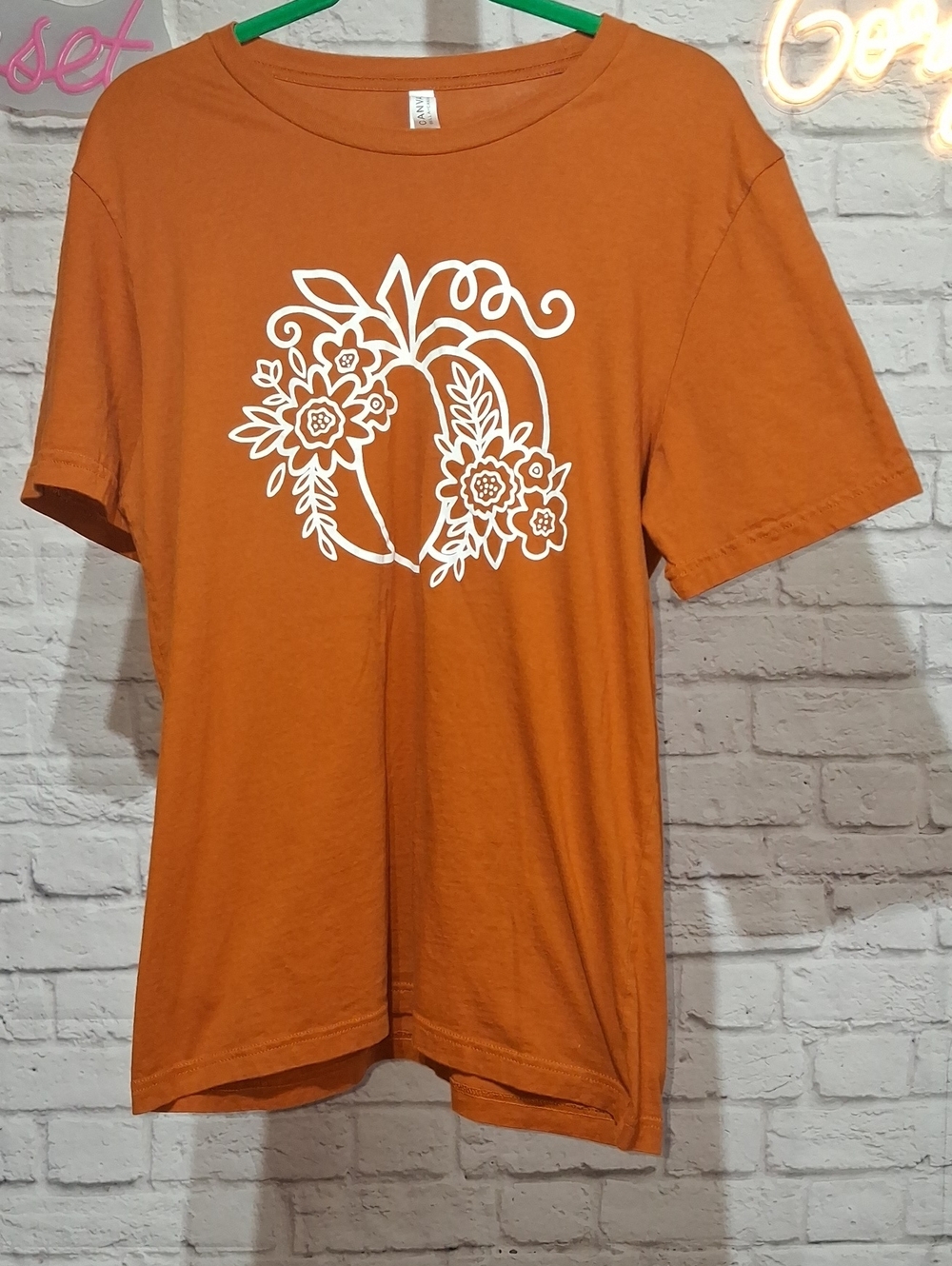 Bella Canvas Orange Short Sleeve Tee with White Floral Pumpkin Graphic
